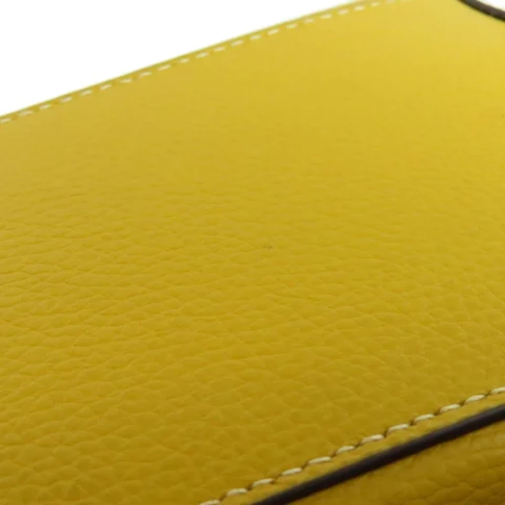 Coach Pre-owned Leather handbags Yellow Dames