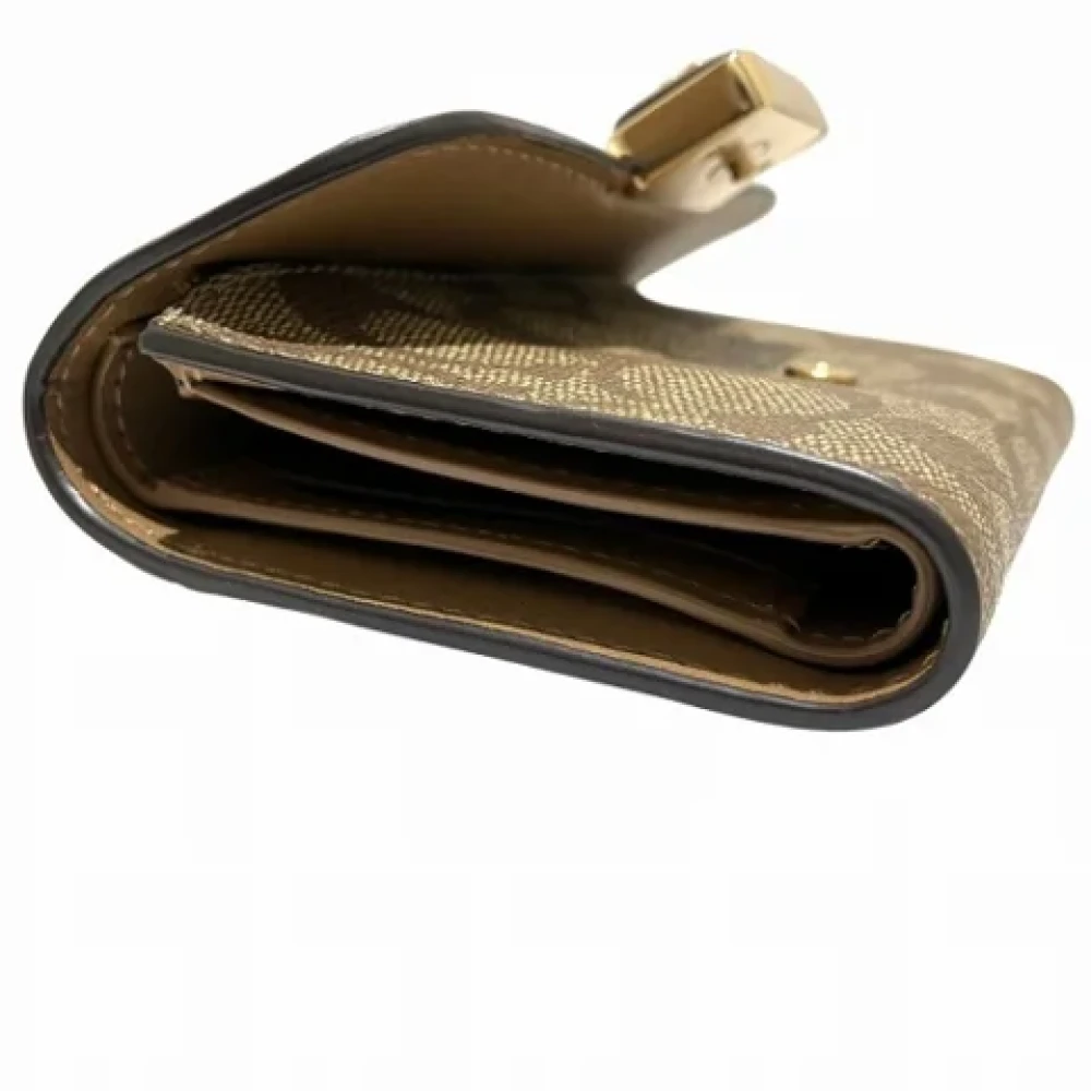 Coach Pre-owned Leather wallets Brown Dames