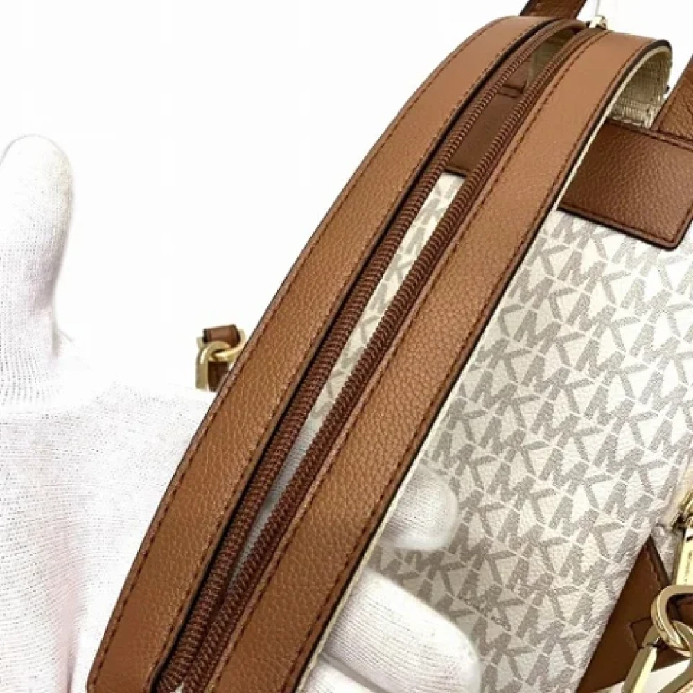 Michael Kors Pre-owned Canvas backpacks Beige Dames