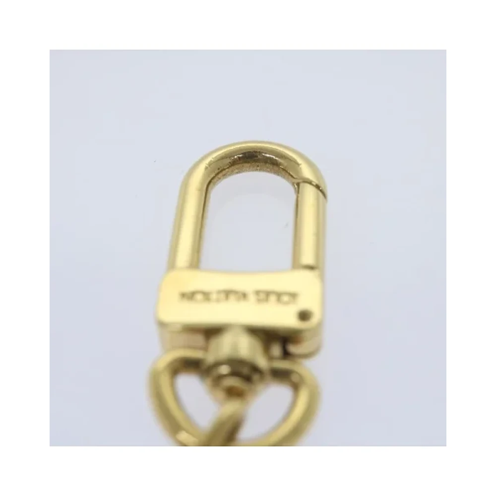 Louis Vuitton Vintage Pre-owned Metal key-holders Yellow Dames