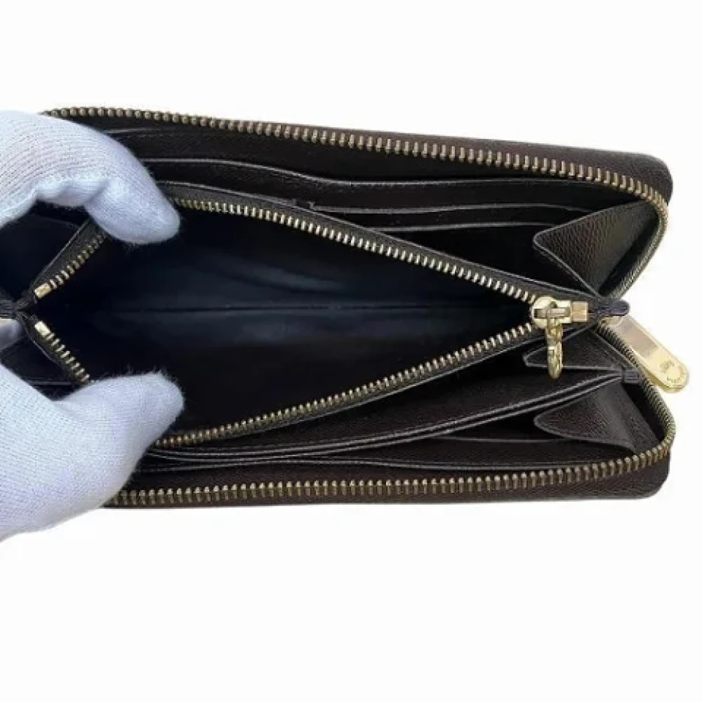 Louis Vuitton Vintage Pre-owned Canvas wallets Brown Dames