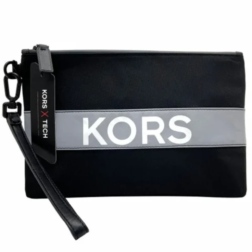 Michael Kors Pre-owned Fabric clutches Black Dames