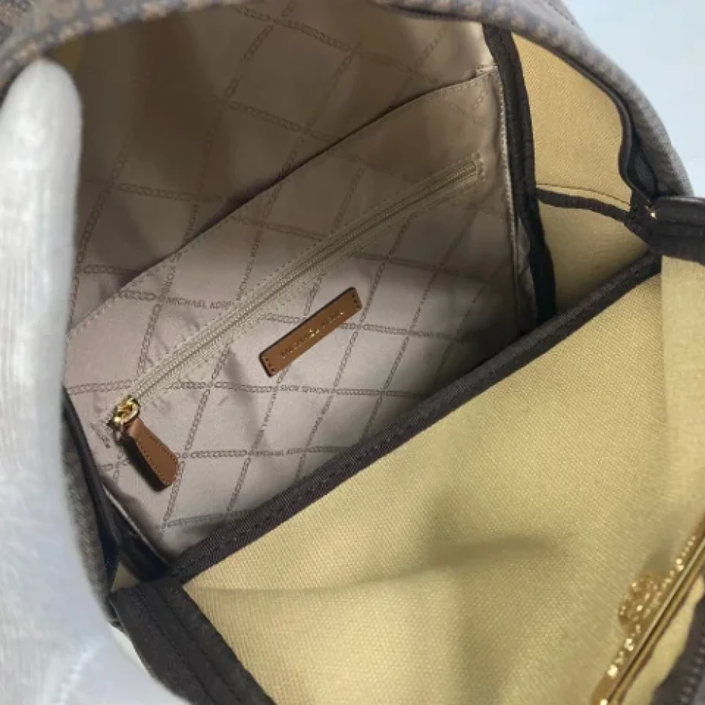 Michael Kors Pre-owned Canvas backpacks Brown Dames