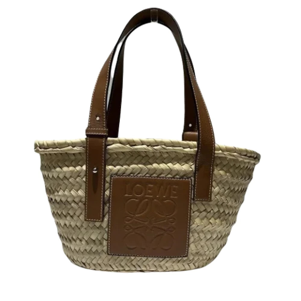 Pre-owned Raffia handbags