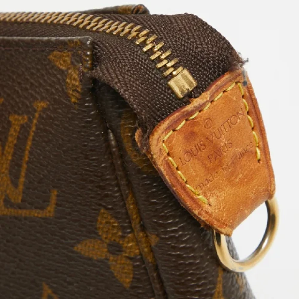 Louis Vuitton Vintage Pre-owned Coated canvas clutches Brown Dames