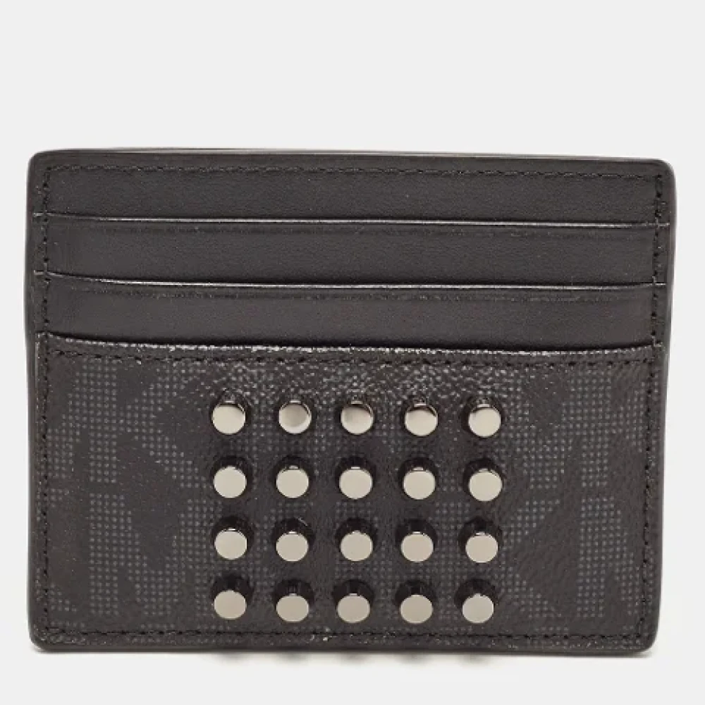 Michael Kors Pre-owned Coated canvas wallets Black Dames