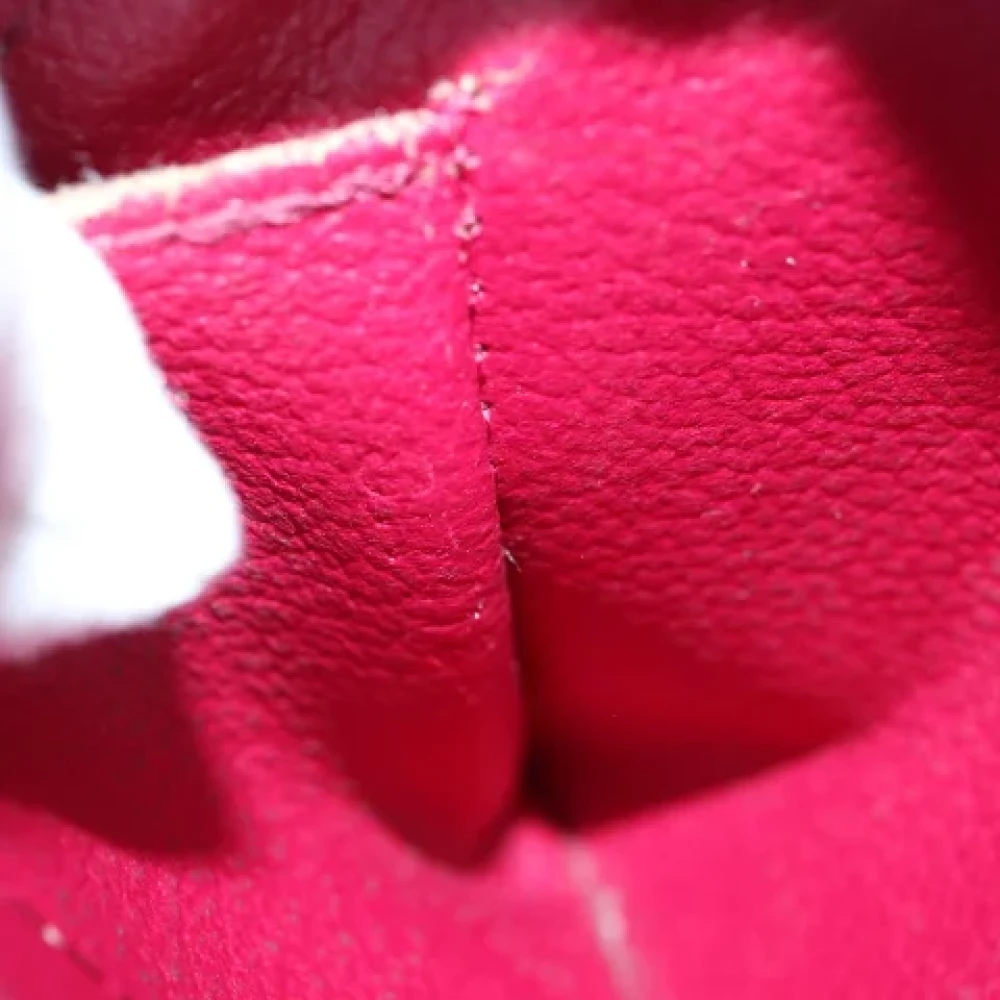 Louis Vuitton Vintage Pre-owned Metal pouches Red Dames