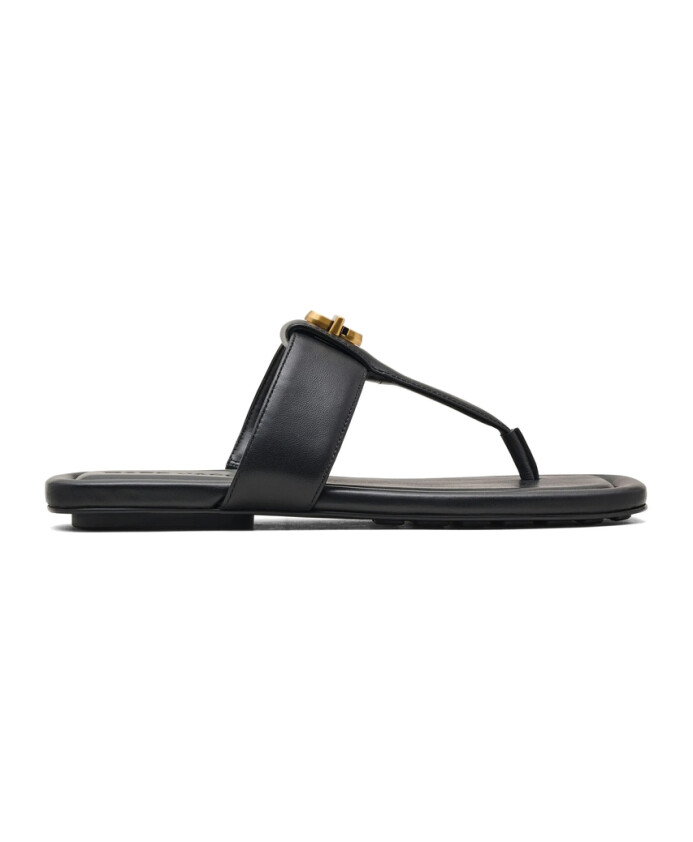 chaussures-slip-on-noires-avec-semelle-logo