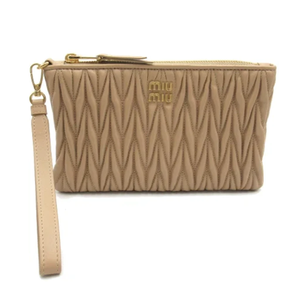 Miu Pre-owned Fabric pouches Beige Dames