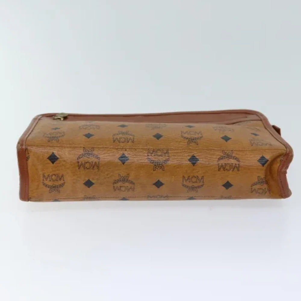 MCM Pre-owned Leather clutches Brown Dames