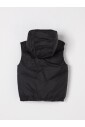 gilet-matelasse-a-capuche-noir