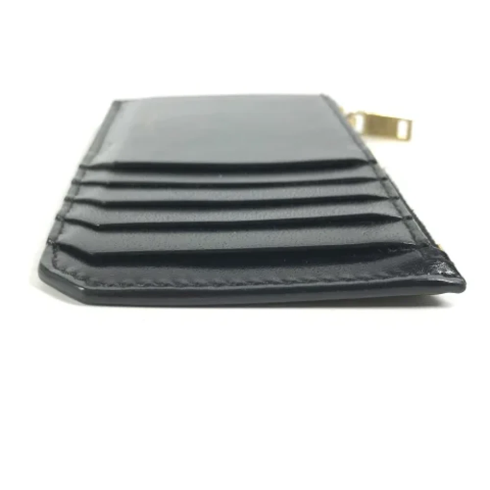 Yves Saint Laurent Vintage Pre-owned Leather wallets Black Heren