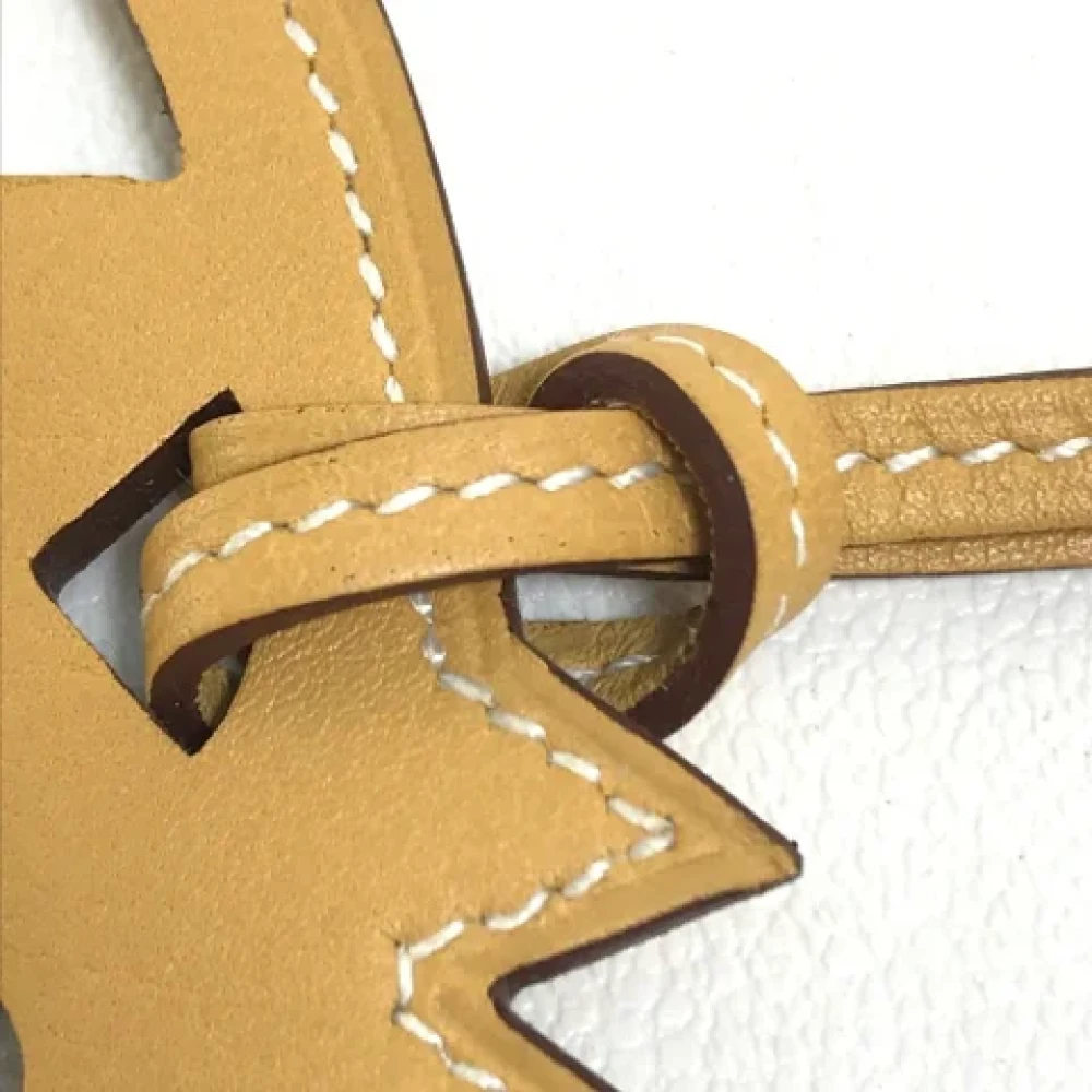 Hermès Vintage Pre-owned Leather key-holders Beige Unisex