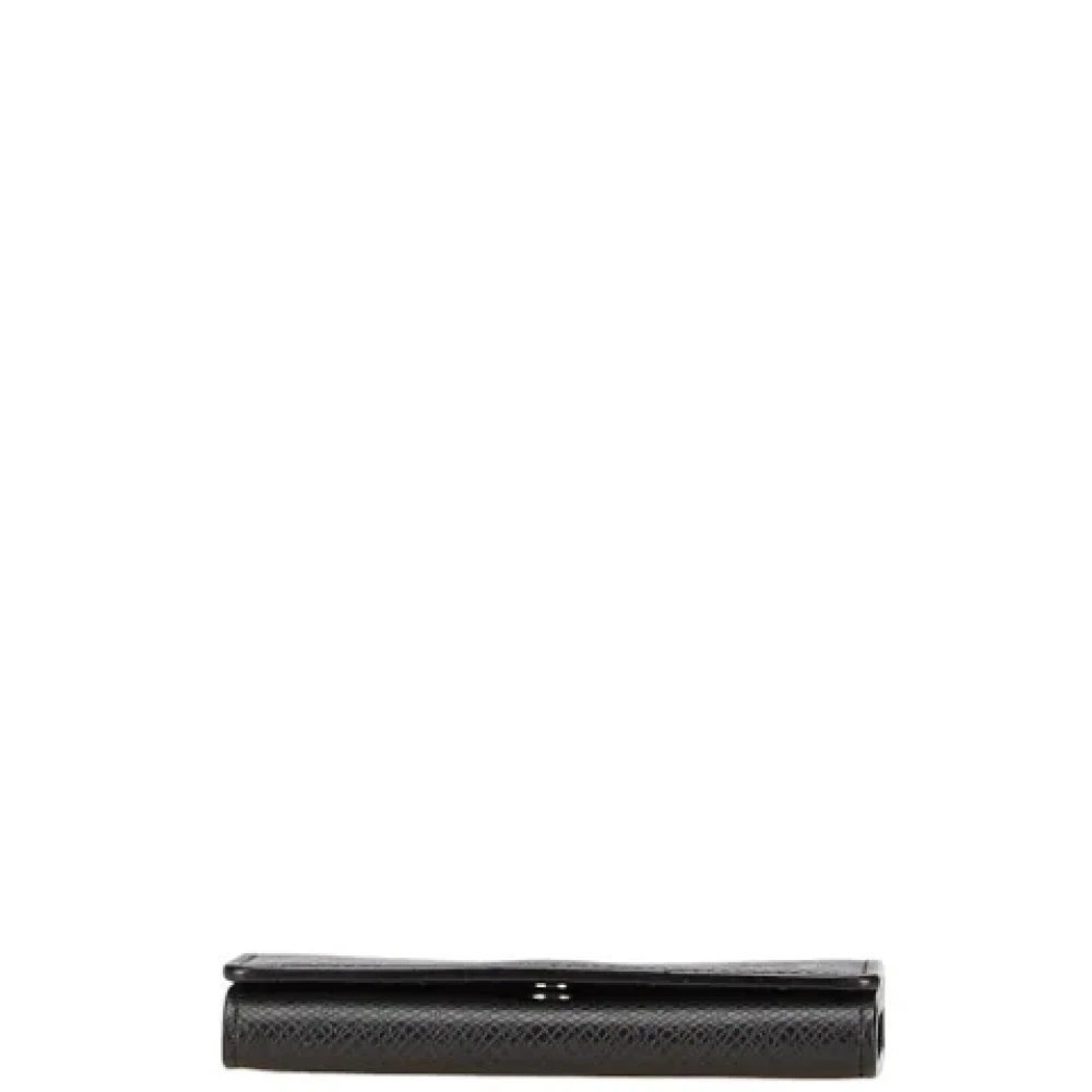 Louis Vuitton Vintage Pre-owned Leather wallets Black Heren