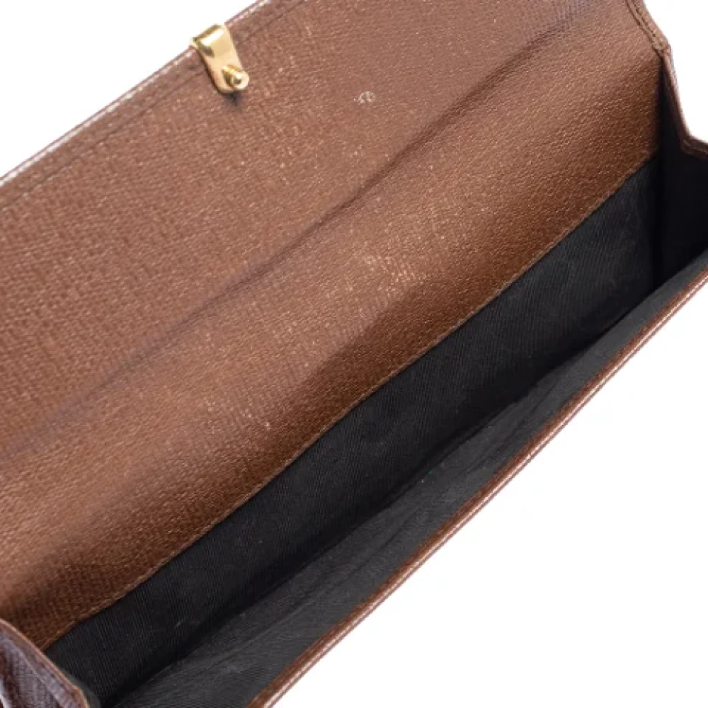 Yves Saint Laurent Vintage Pre-owned Leather wallets Brown Dames