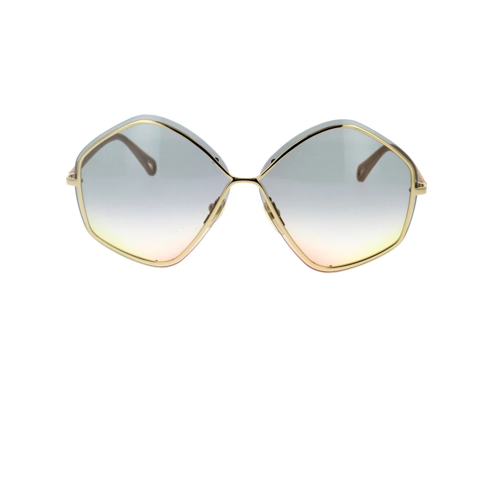 Trendy pentagonale solbriller med fargede linser