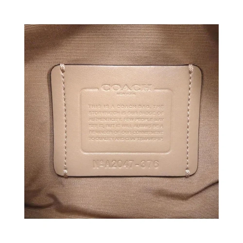 Coach Pre-owned Cotton clutches White Dames