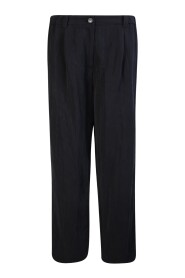 Straight-cut black trousers by Kenzo, inspired by designer Nigo real-to-wear philosophy