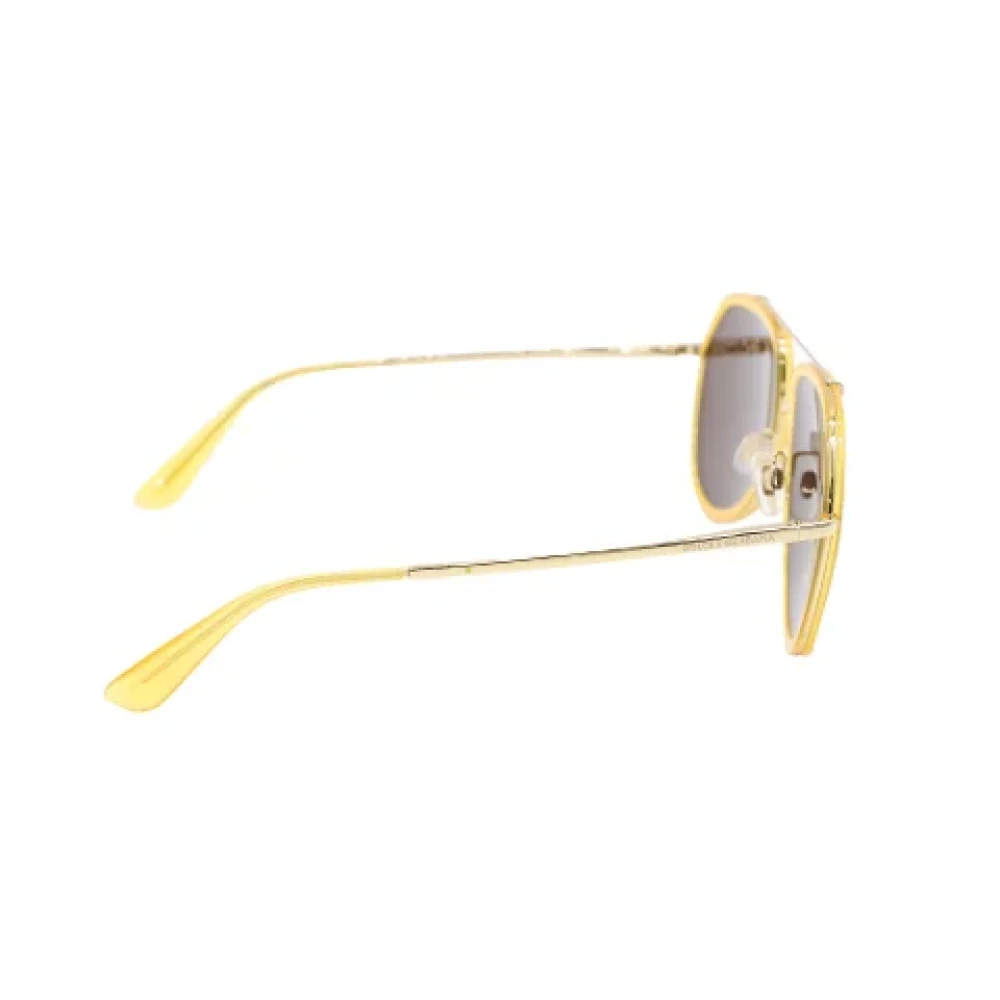 Dolce & Gabbana Pre-owned Metal sunglasses Yellow Dames