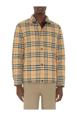Reversibel rutig quiltad jacka