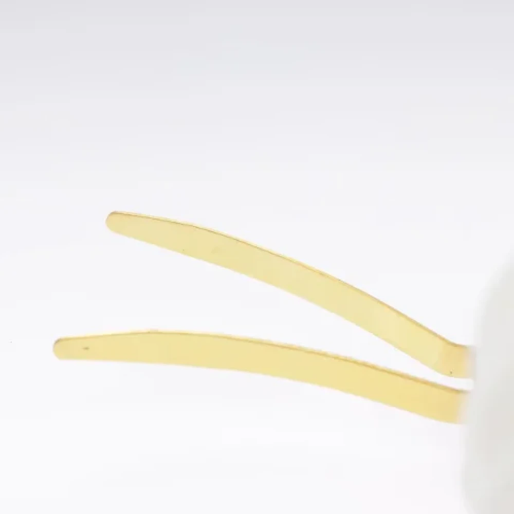 Chanel Vintage Pre-owned Metal hair-accessories Yellow Dames