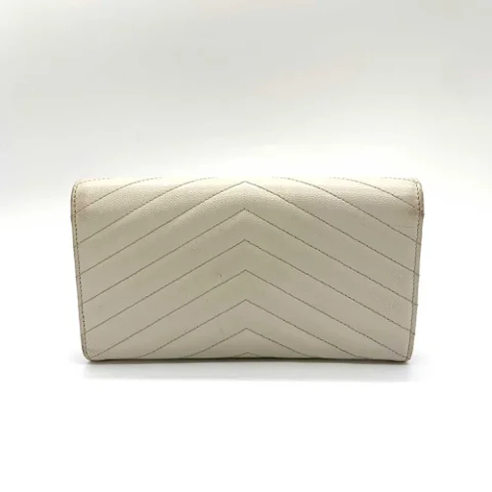 Yves Saint Laurent Vintage Pre-owned Leather wallets Beige Dames