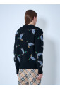 pull-en-laine-avec-canard