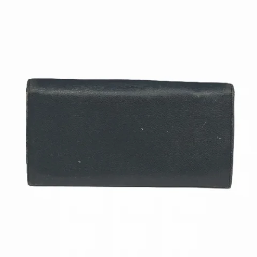 Yves Saint Laurent Vintage Pre-owned Leather wallets Black Dames