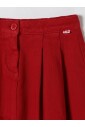 jupe-enfant-plissee-en-rouge-brique