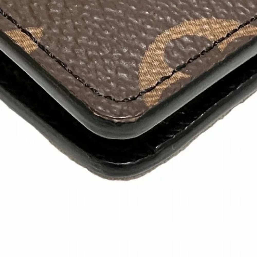 Louis Vuitton Vintage Pre-owned Leather wallets Brown Heren