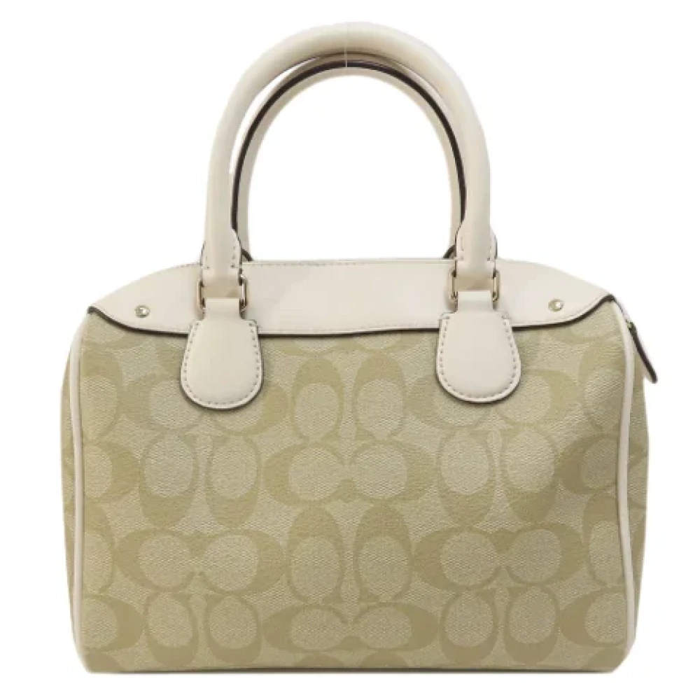 Coach Pre-owned Plastic handbags Beige Dames