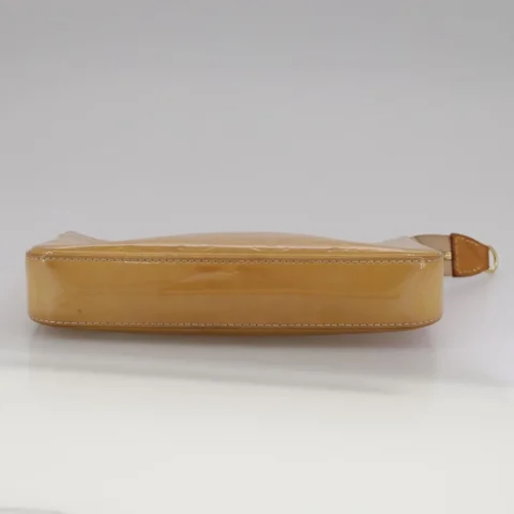 Louis Vuitton Vintage Pre-owned Leather pouches Beige Dames