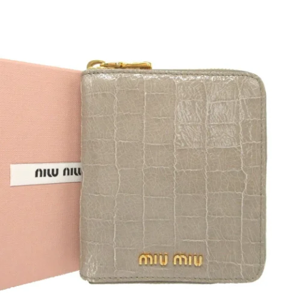 Miu Pre-owned Leather wallets Gray Dames
