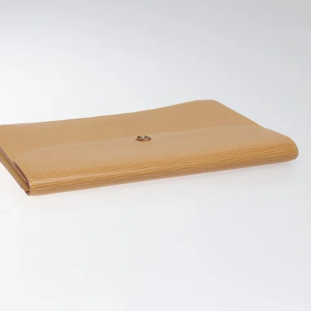 Louis Vuitton Vintage Pre-owned Leather clutches Beige Dames