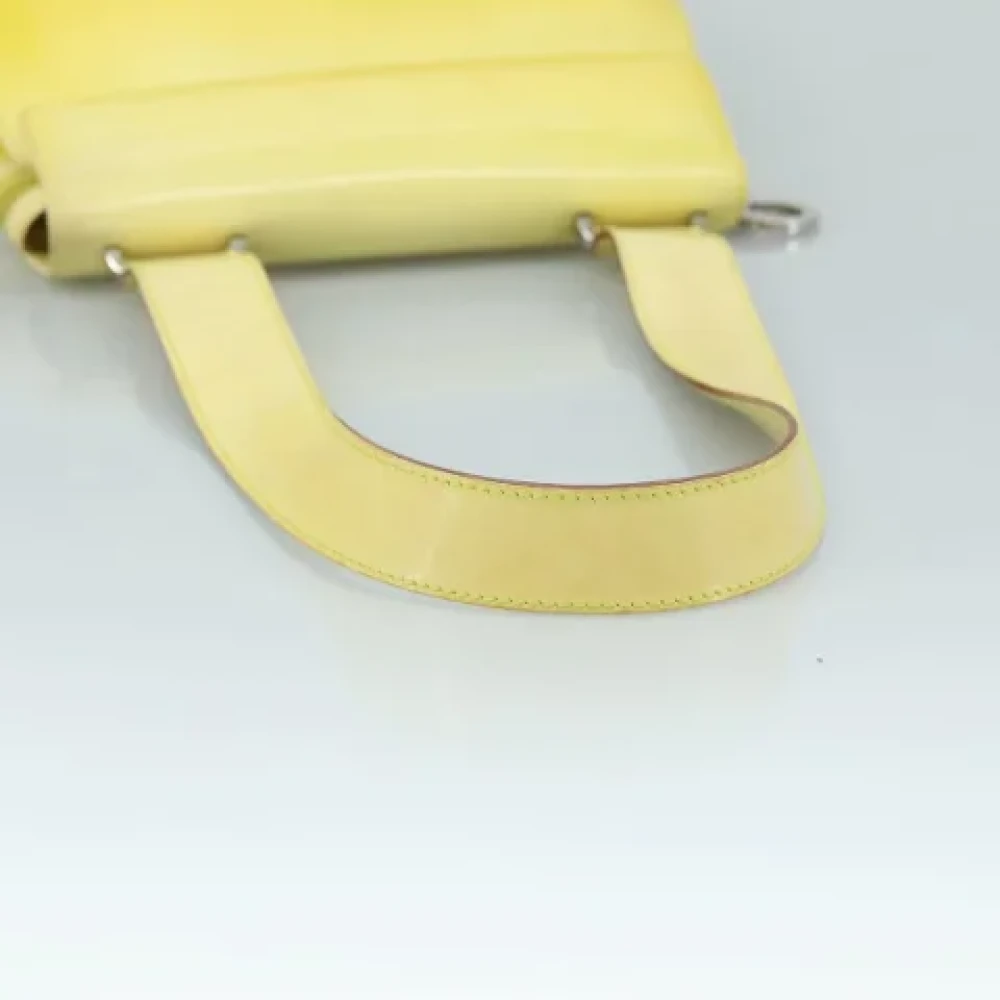 Salvatore Ferragamo Pre-owned Canvas handbags Yellow Dames