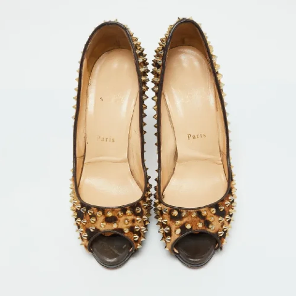 Christian Louboutin Pre-owned Fabric heels Brown Dames