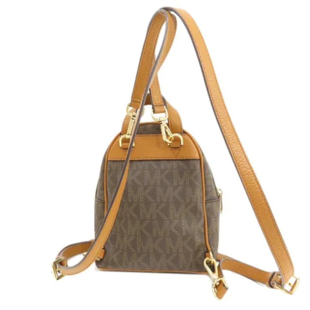 Michael Kors Pre-owned Canvas backpacks Brown Dames