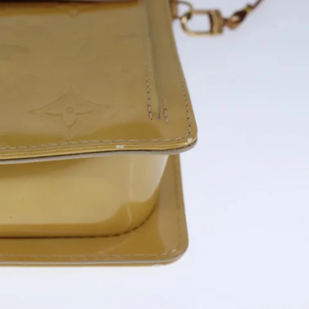 Louis Vuitton Vintage Pre-owned Leather clutches Beige Dames