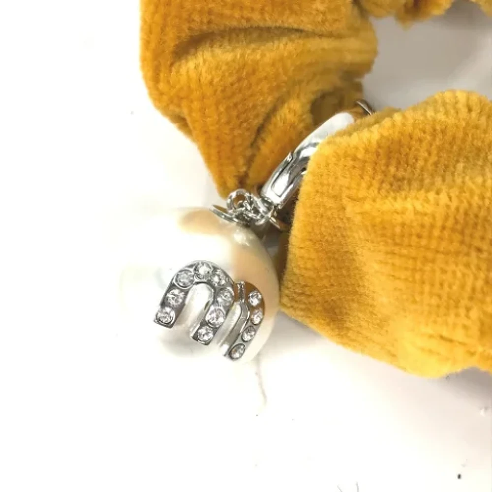 Miu Pre-owned Velvet hair-accessories Yellow Dames
