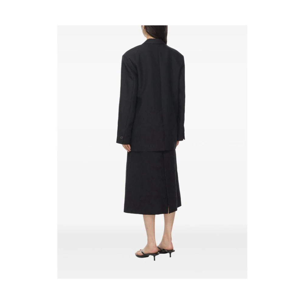 Studio Nicholson Zwarte Jas met Gesp Sluiting Black Dames