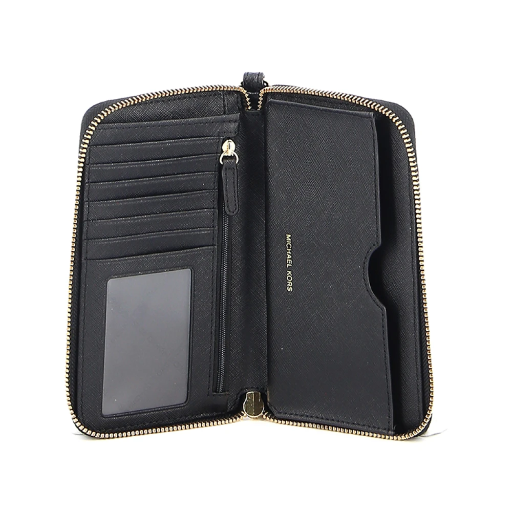 Michael Kors Zwarte gehamerde leren portemonnee met gouden details Black Dames
