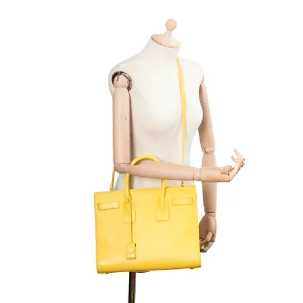 Yves Saint Laurent Vintage Pre-owned Leather handbags Yellow Dames