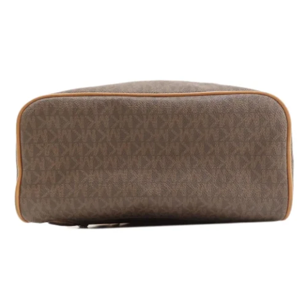Michael Kors Pre-owned Canvas backpacks Brown Dames