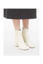 bottes-laser-cut-en-daim-blanc-perle