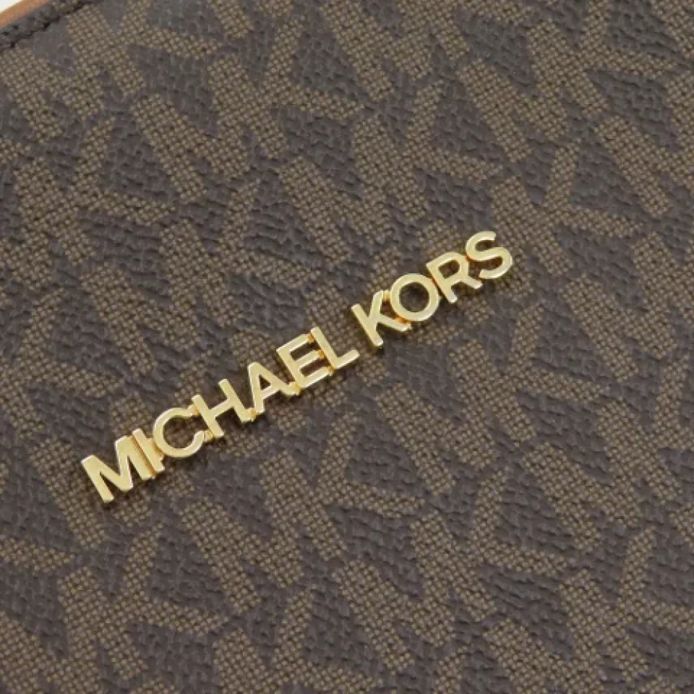 Michael Kors Pre-owned Plastic backpacks Brown Dames