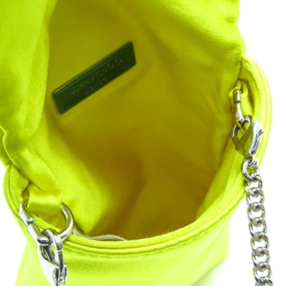 Jimmy Choo Pre-owned Satin clutches Yellow Dames