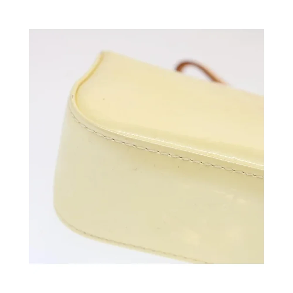 Louis Vuitton Vintage Pre-owned Leather clutches Yellow Dames