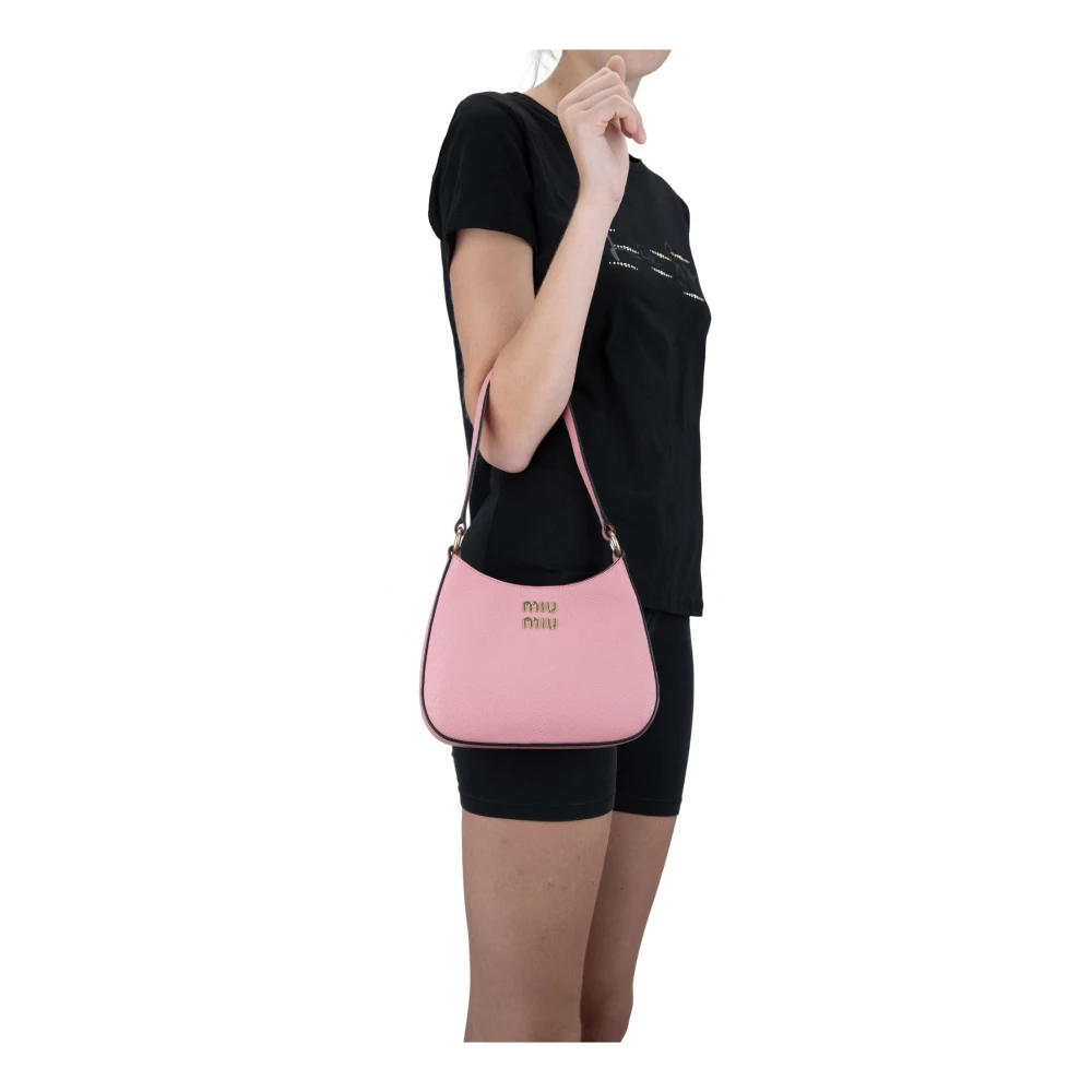 Miu Leren handtas met magnetische knoop Pink Dames