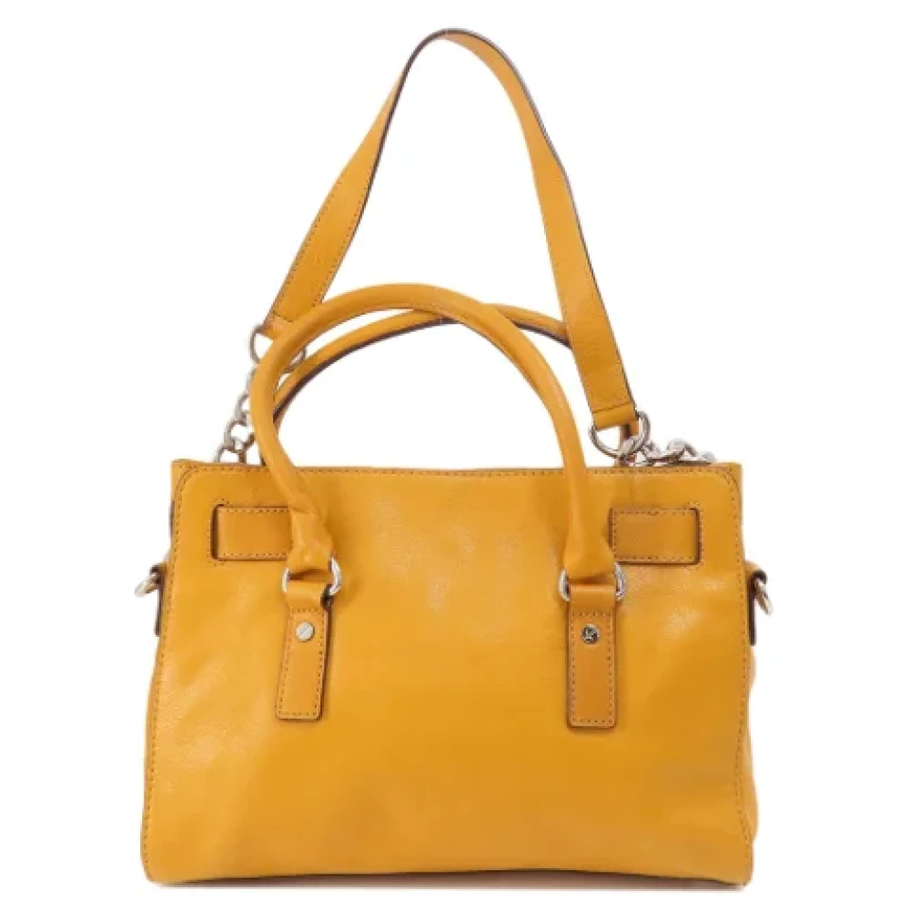 Michael Kors Pre-owned Fabric handbags Yellow Dames