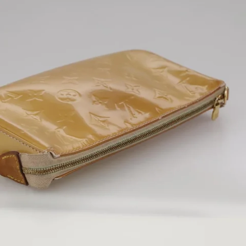 Louis Vuitton Vintage Pre-owned Leather pouches Beige Dames
